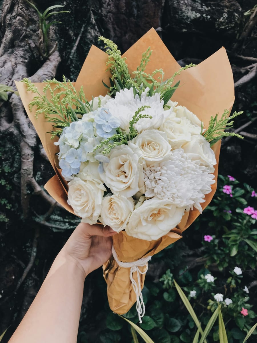 A bouquet of white roses and hydrangea